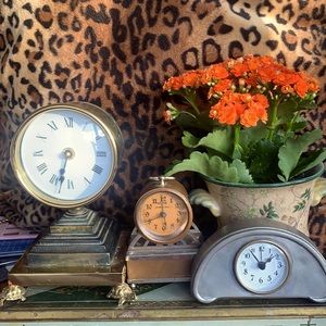 Clocks grouping of antique Horchow home decor